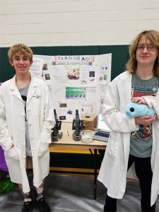 Ben-Deacon-and-Josh-Ziegler-in-front-of-their-Science-Fair-project